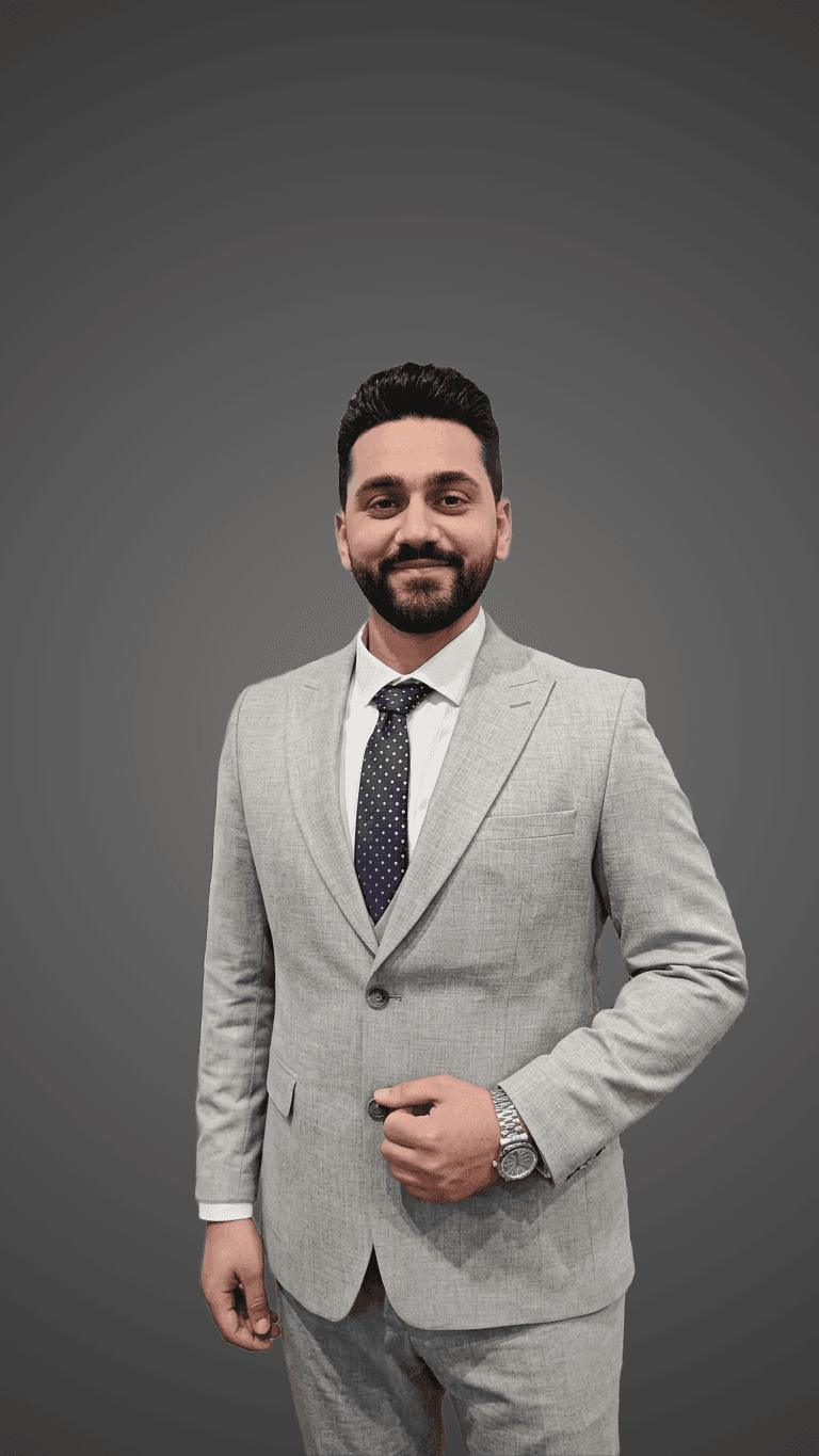 Professional portrait of a developer in a modern office setting with soft lighting